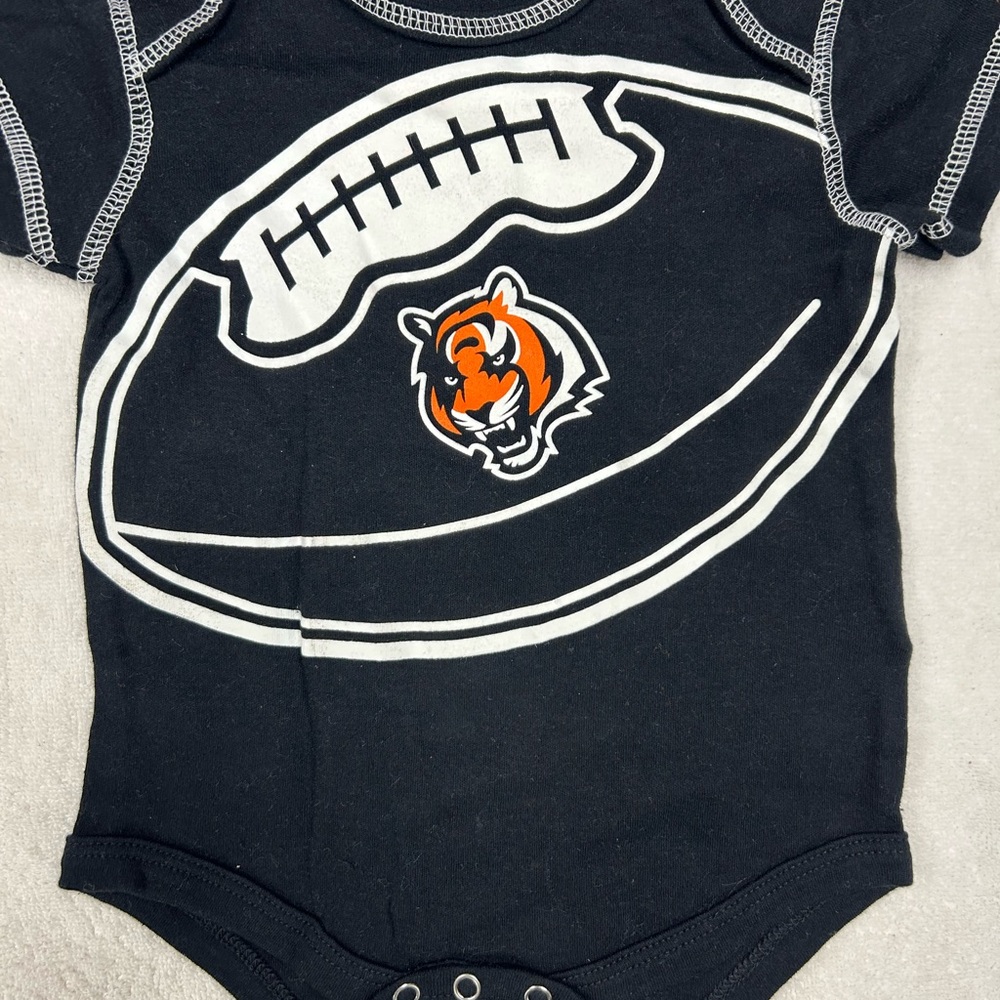 NFL Cincinnati Bengals, Black and Orange Football Graphic baby 12 month onesie.